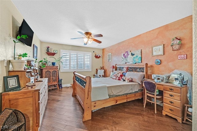 bedroom with dark wood-type flooring