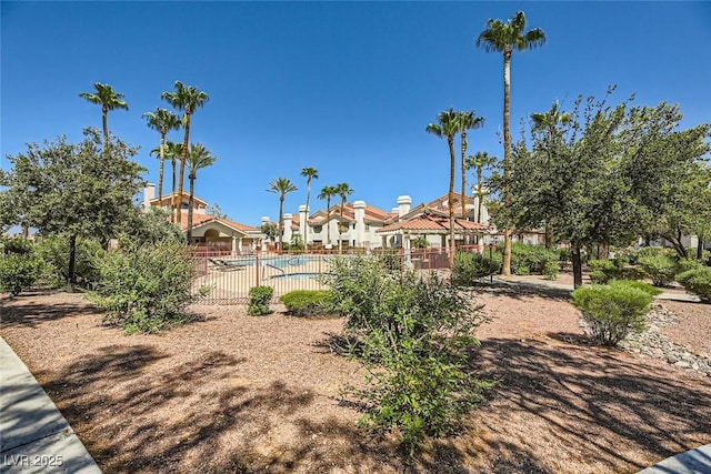 view of yard featuring a fenced in pool