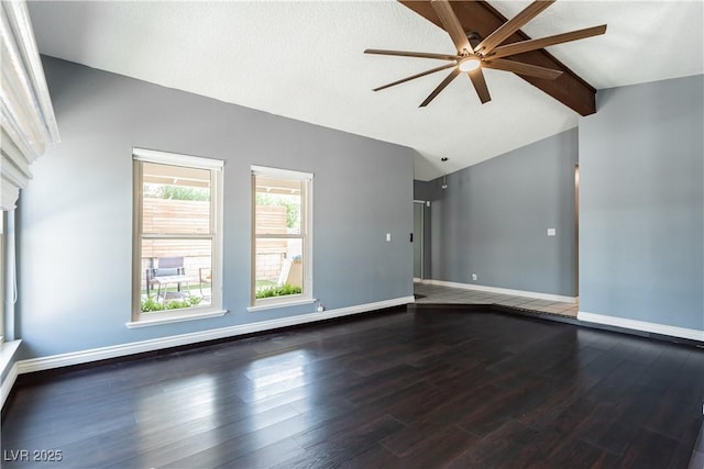 unfurnished living room with lofted ceiling with beams, dark wood-type flooring, and ceiling fan