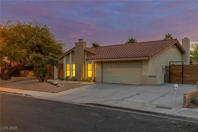 view of front of home with a garage