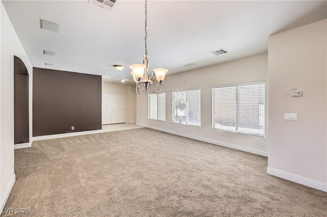 interior space featuring an inviting chandelier