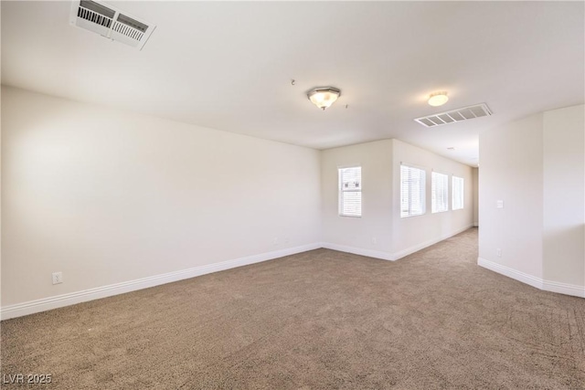 empty room featuring carpet flooring