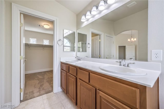 bathroom with vanity and tile patterned flooring