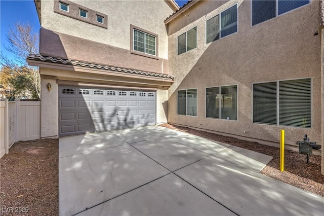 view of property exterior featuring a garage