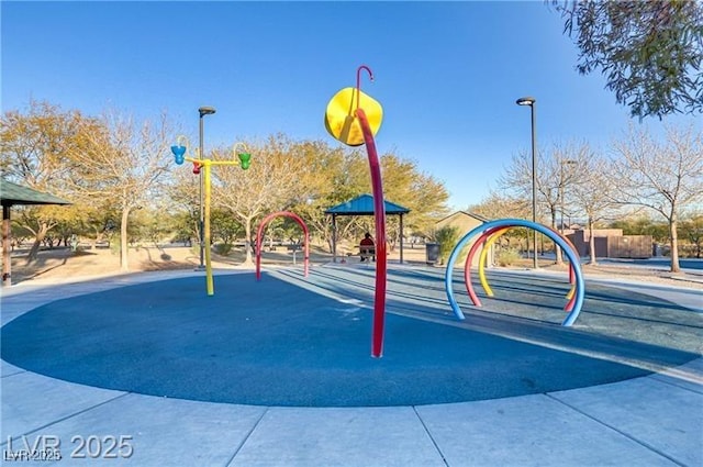 view of property's community featuring a playground