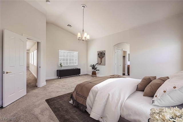 bedroom with light carpet, a notable chandelier, and vaulted ceiling