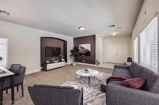 living room with light colored carpet