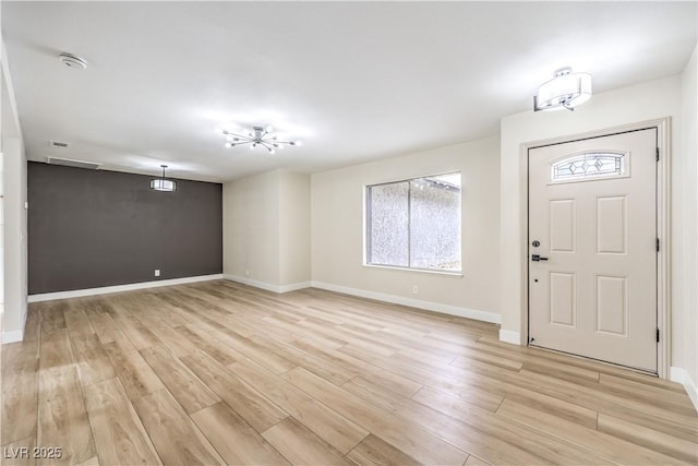 entrance foyer featuring light wood-type flooring