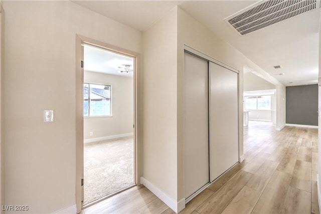 hall featuring light hardwood / wood-style floors