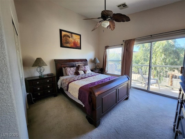 carpeted bedroom featuring access to outside and ceiling fan