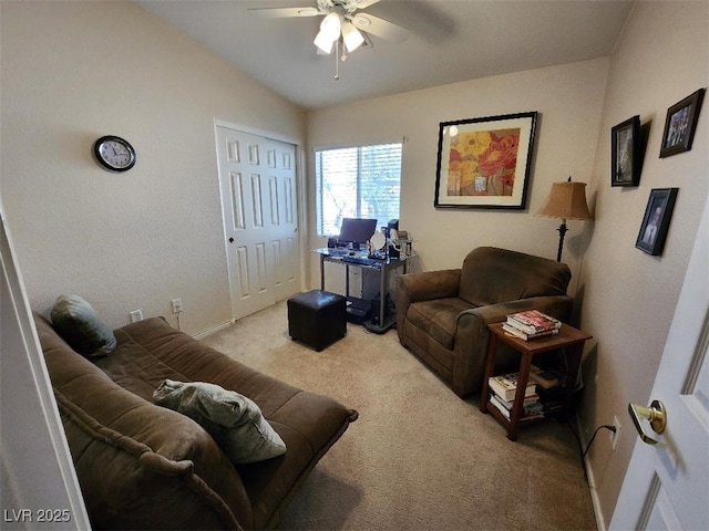 living room featuring light carpet, lofted ceiling, and ceiling fan