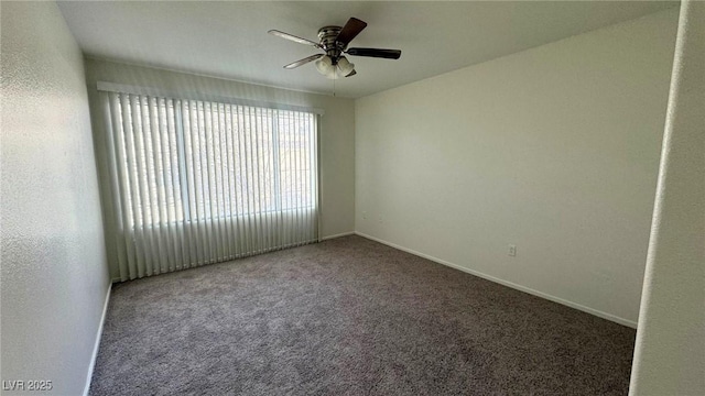 unfurnished room with carpet floors and ceiling fan