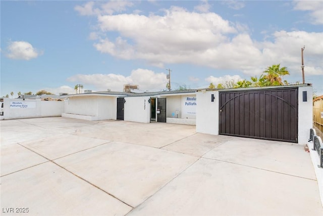 exterior space with a gate