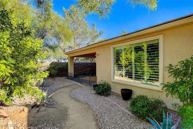 view of side of property with a patio area