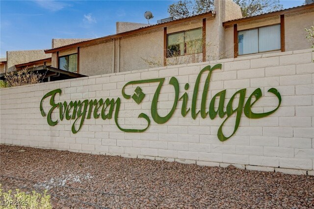 view of community sign