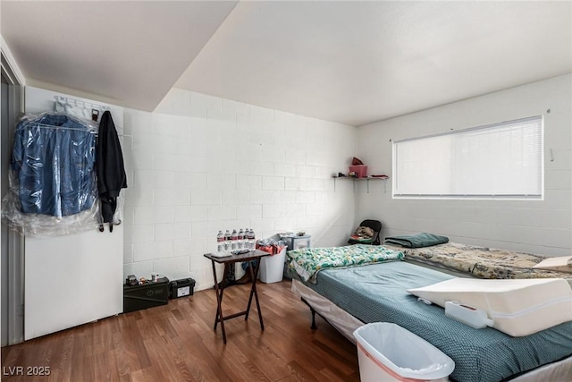 bedroom featuring dark wood-type flooring