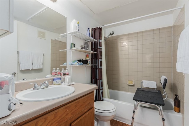 full bathroom featuring toilet, vanity, and shower / bathtub combination with curtain