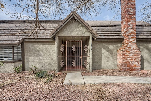 3954 Edgemoor Way, Las Vegas, NV 89121 - property entrance featuring stucco siding