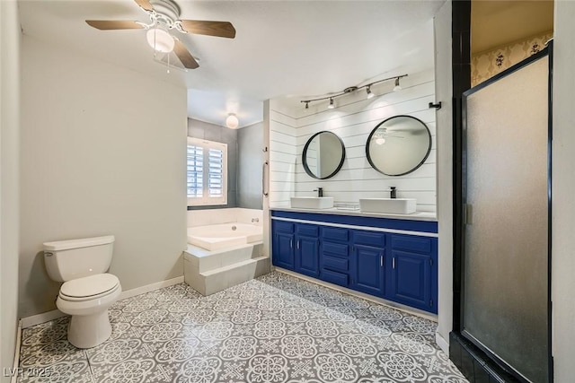 3954 Edgemoor Way, Las Vegas, NV 89121 - full bath featuring a garden tub, double vanity, a ceiling fan, and a stall shower