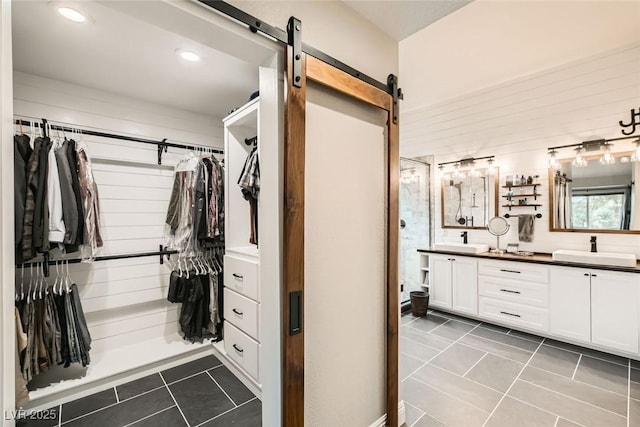 bathroom featuring tile patterned flooring and vanity