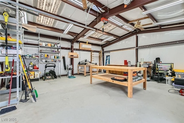 garage with a workshop area