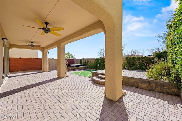 view of patio / terrace featuring ceiling fan