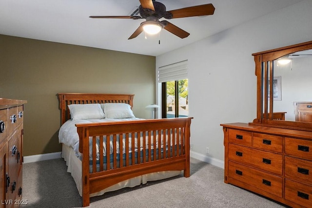 bedroom with light colored carpet and ceiling fan