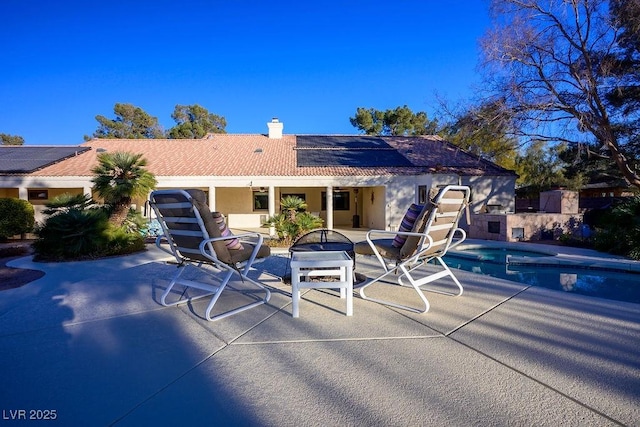 view of pool with a patio area