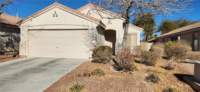 ranch-style house featuring a garage