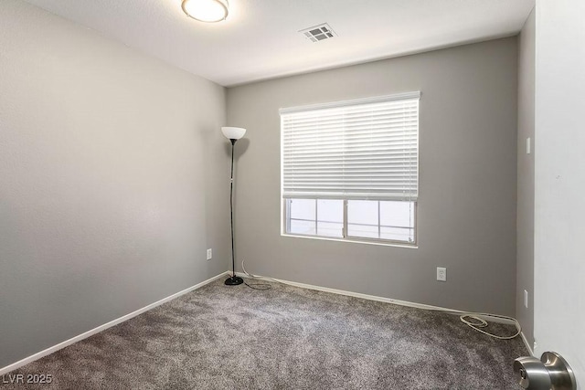 spare room featuring carpet flooring