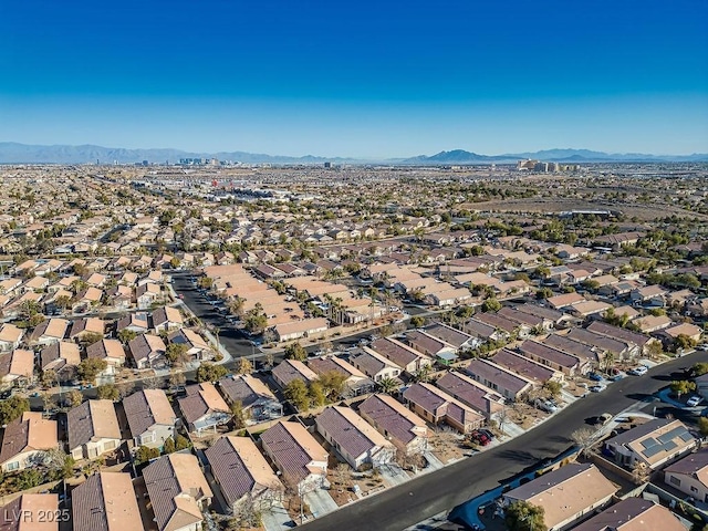 drone / aerial view featuring a mountain view