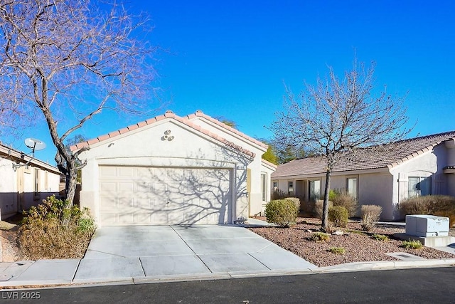 single story home featuring a garage