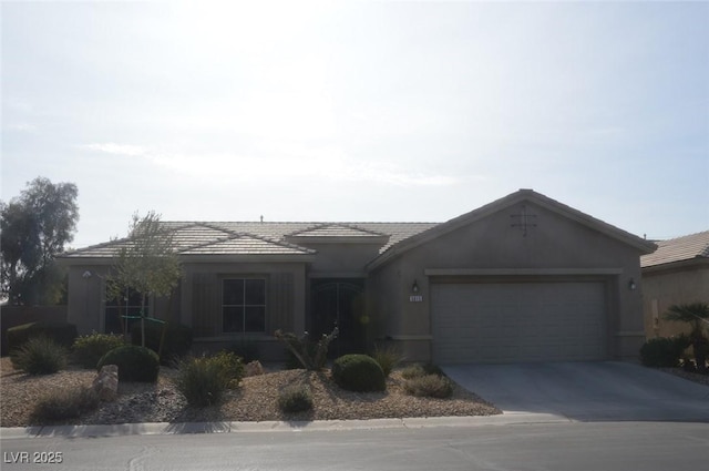 single story home with a garage