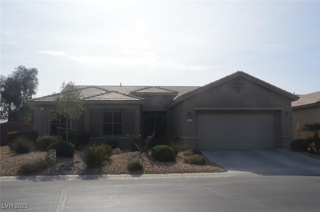 ranch-style home featuring a garage