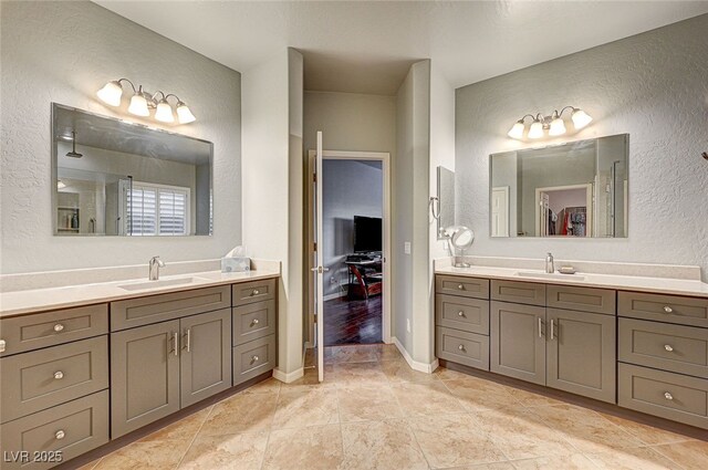 bathroom with vanity and tile patterned floors