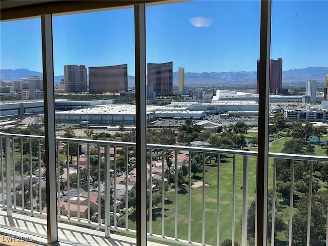 balcony featuring a mountain view