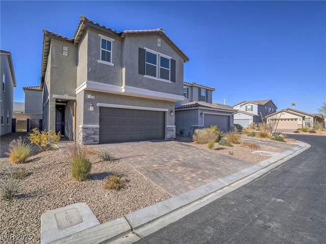 view of front of home with a garage