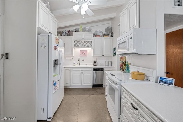 kitchen featuring sink, lofted ceiling with beams, ceiling fan, white appliances, and white cabinets