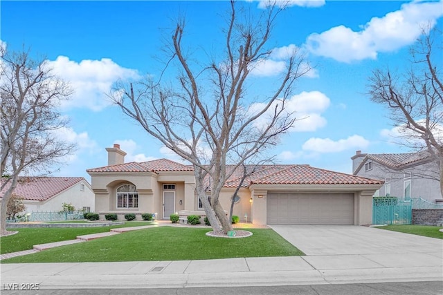 mediterranean / spanish house with a garage and a front lawn