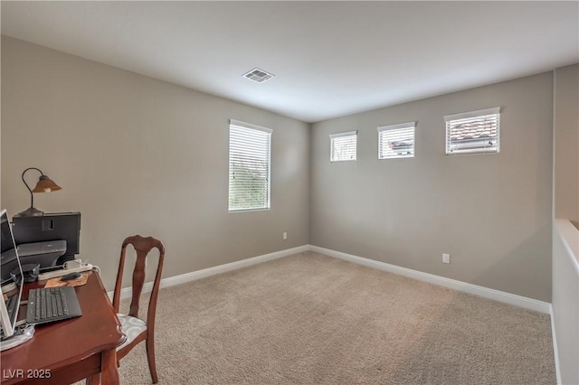 office space featuring light colored carpet