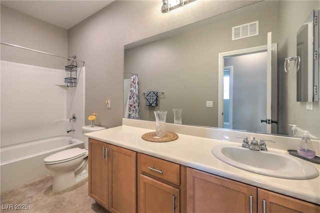 full bathroom featuring vanity, shower / bath combination with curtain, and toilet