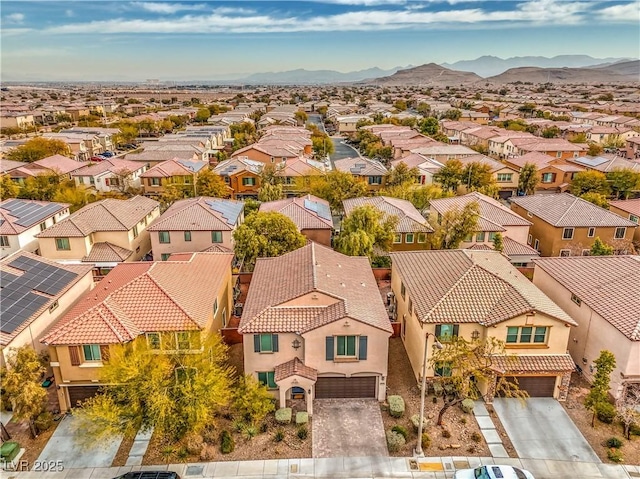 drone / aerial view featuring a mountain view