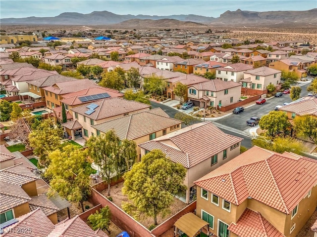 drone / aerial view featuring a mountain view