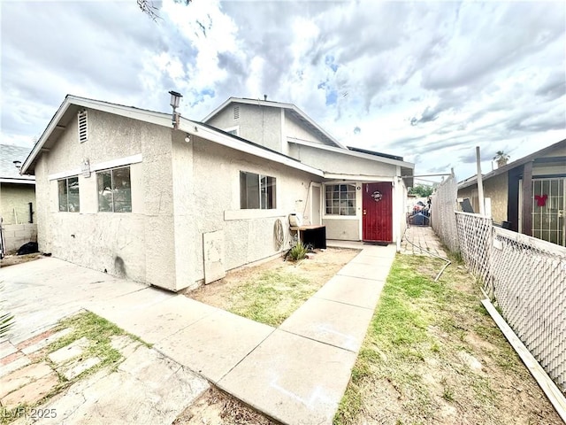 3620 Park Oliver Dr, Las Vegas, NV 89110 - back of house with stucco siding and a patio