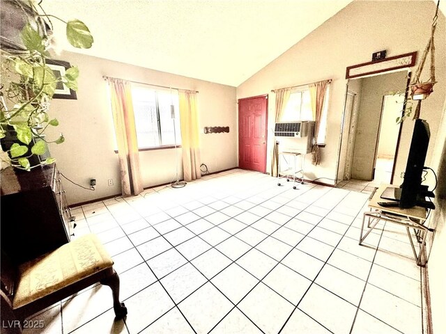 3620 Park Oliver Dr, Las Vegas, NV 89110 - unfurnished living room with vaulted ceiling, cooling unit, and light tile patterned floors