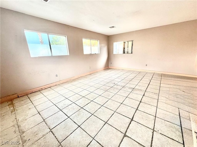 3620 Park Oliver Dr, Las Vegas, NV 89110 - spare room featuring baseboards and light tile patterned floors