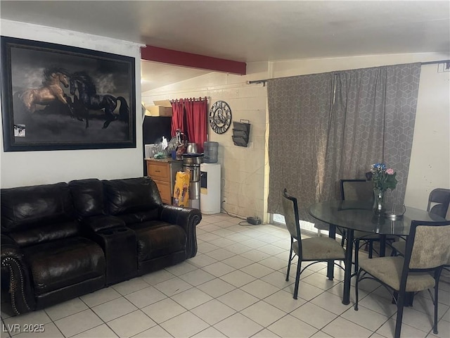 tiled living room with beam ceiling