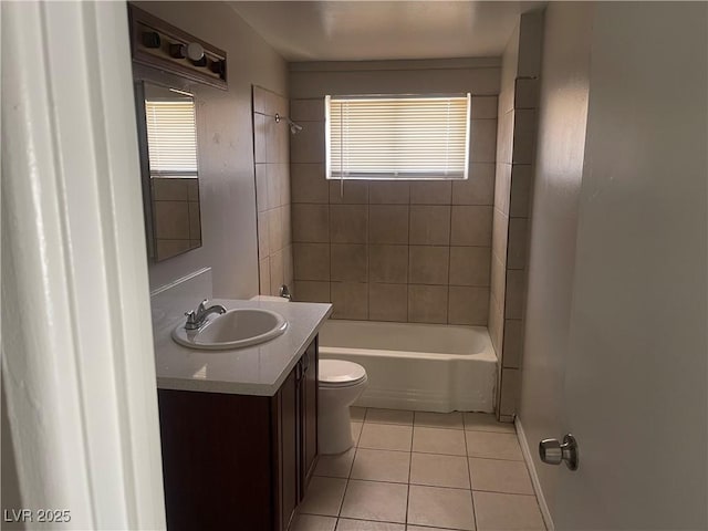 1901 Belmont St, North Las Vegas, NV 89030 - bathroom with tile patterned flooring, vanity, and shower / washtub combination