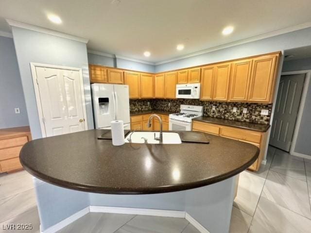 kitchen with tasteful backsplash, an island with sink, sink, crown molding, and white appliances