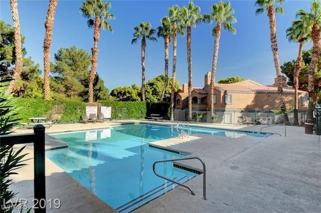 view of swimming pool featuring a patio